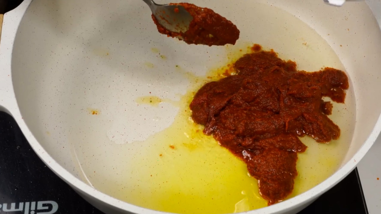 Egg Rice Add the grounded paste
