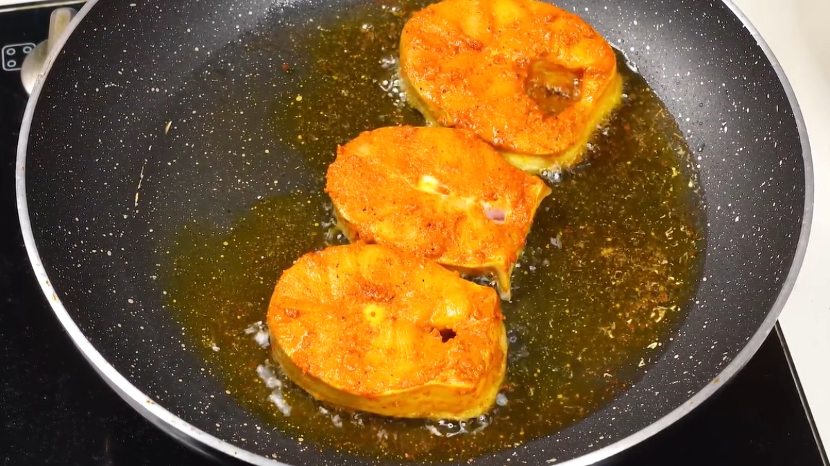 Fry fish slightly for fish curry 