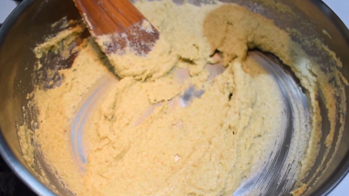 Stir the onion paste for Mor kulambu