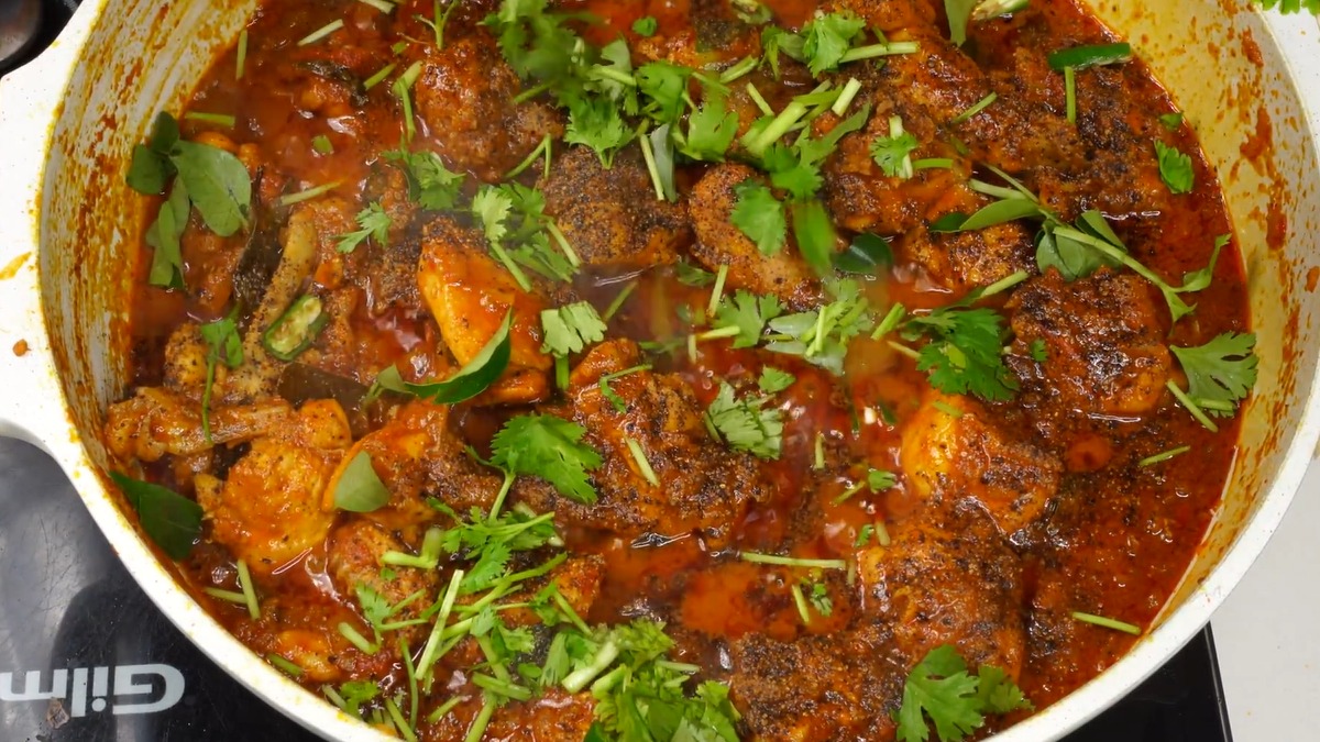 Garnish and serve the chicken gravy masala